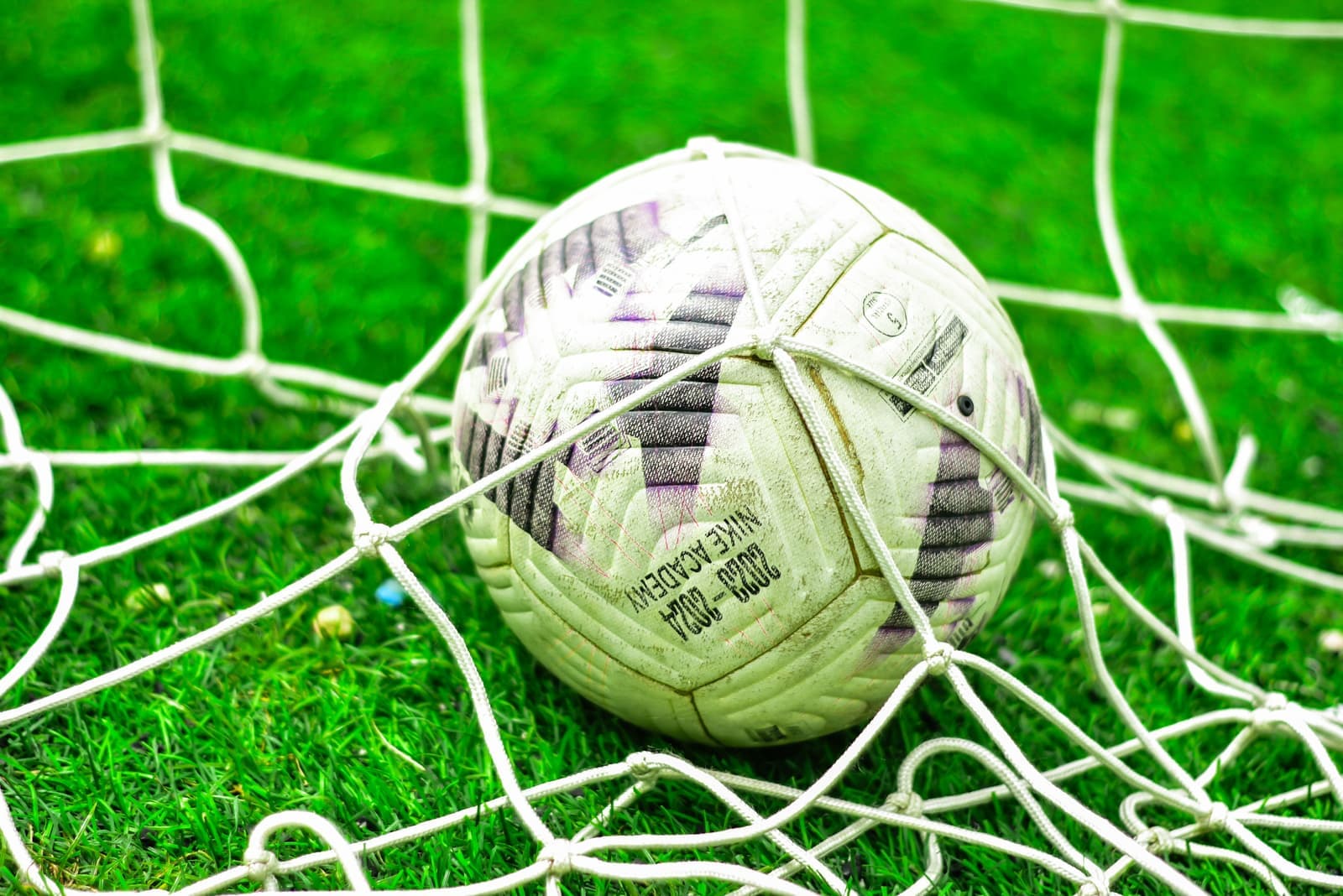 A portable pop-up soccer goal on a lawn